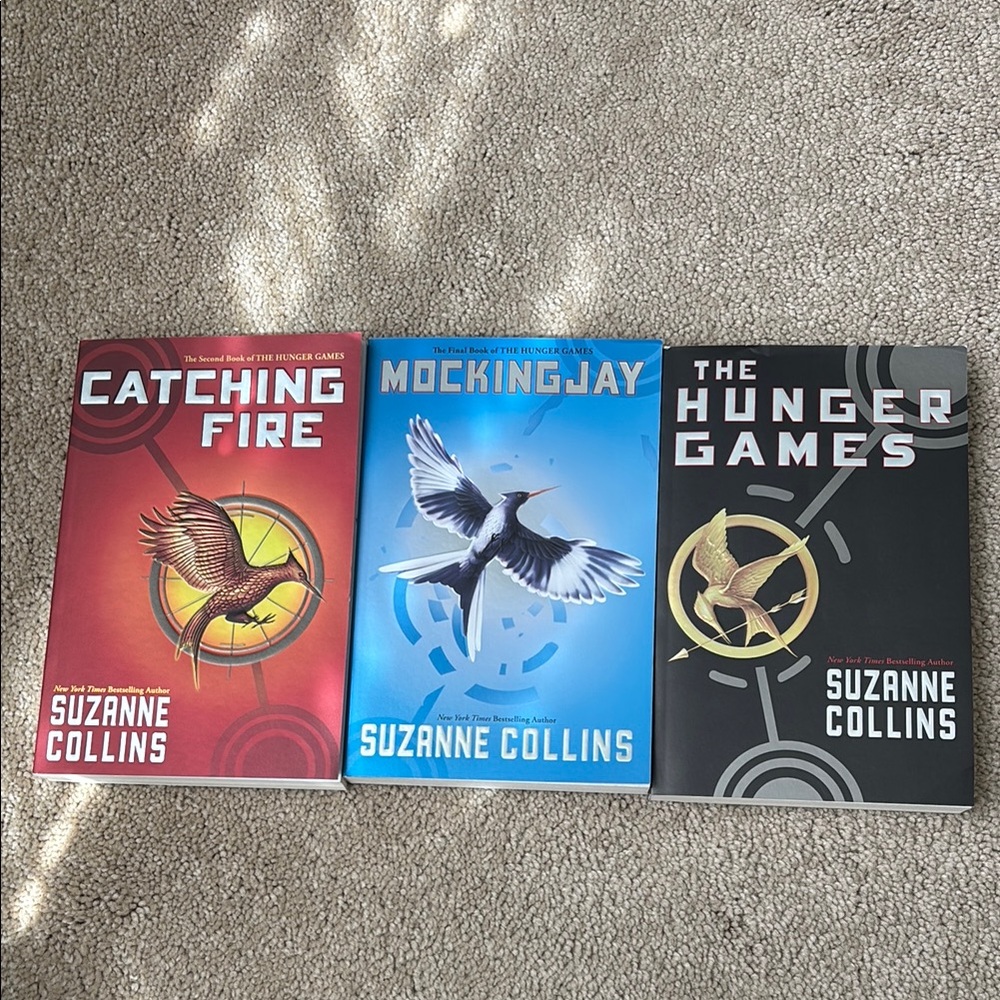 The Hunger Games Trilogy Set - Red, Blue, Black. Only read the hunger games.